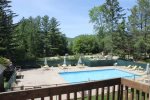 View from balcony of shared outdoor pool in Waterville Valley Vacation Condo 